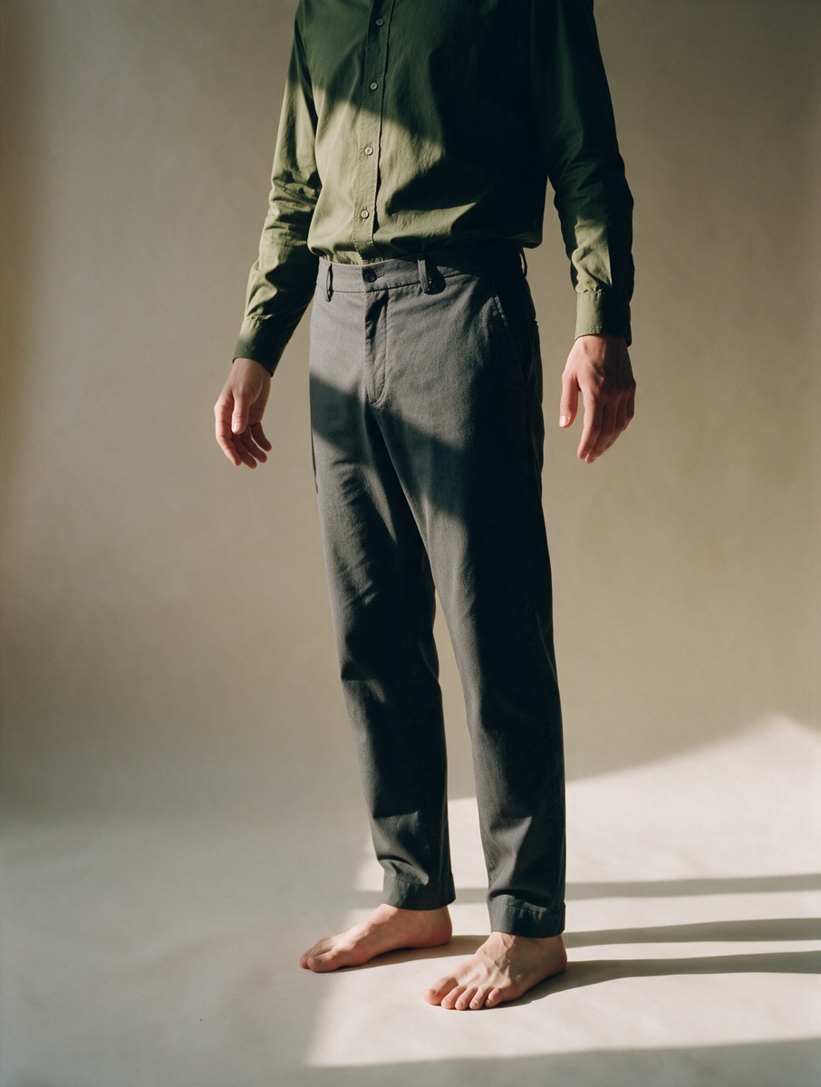 Olive shirt and charcoal trousers, worn