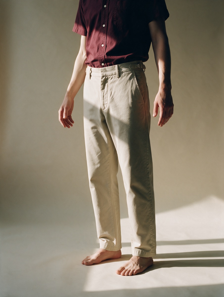 Burgundy shirt and stone trousers, worn